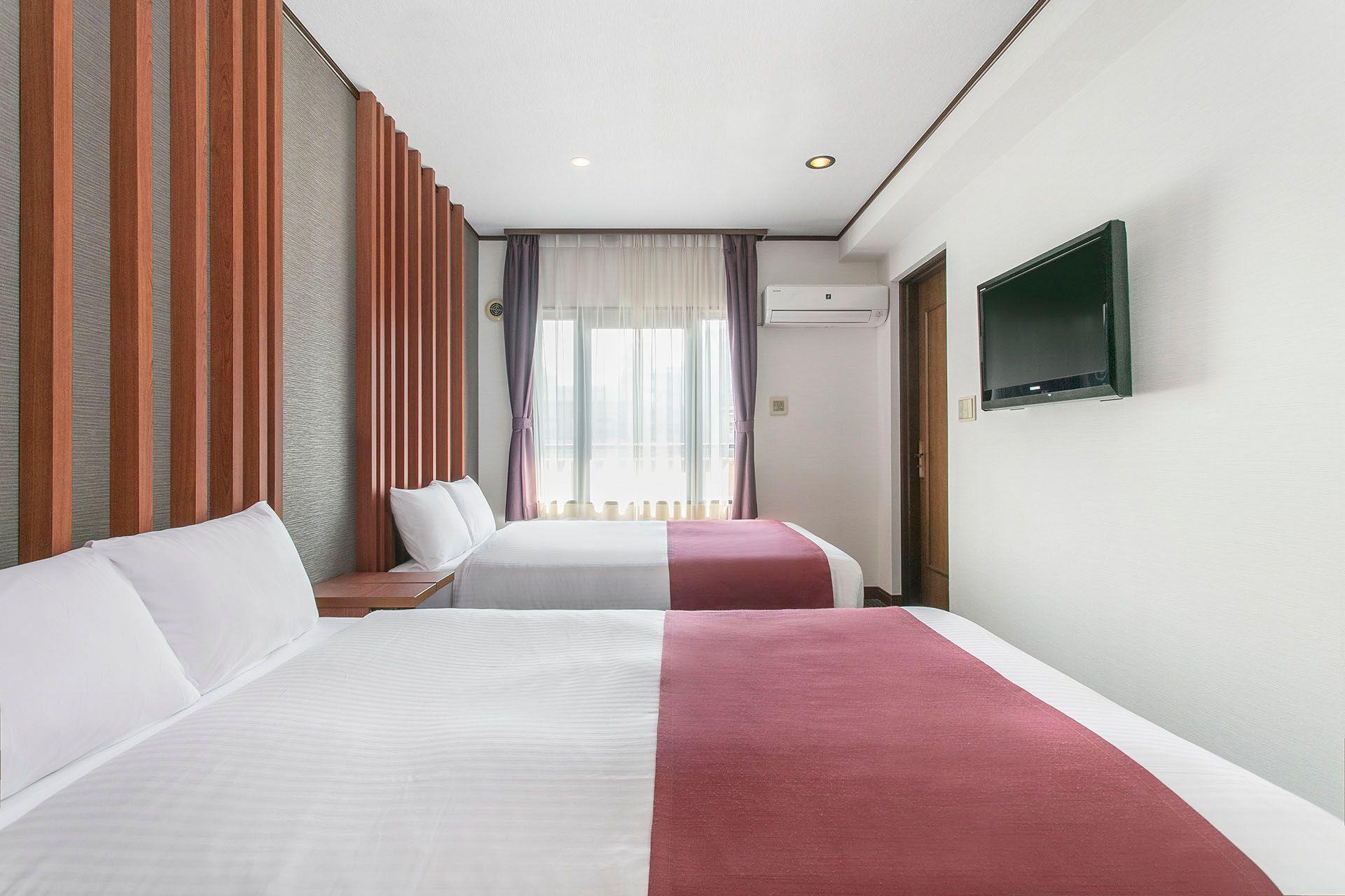 MS_Kameido_P1_Room_Deluxe_Twin_TreeView_Bed_02_1920_1280.jpg
